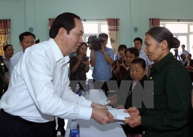 Le président Tran Dai Quang visite Quang Nam - ảnh 1